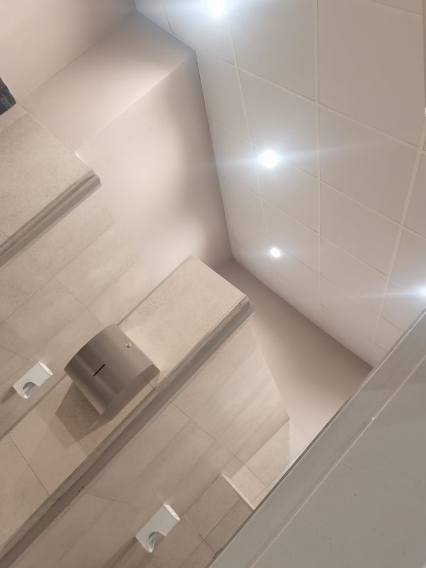 Bathroom interior with ceiling tiles