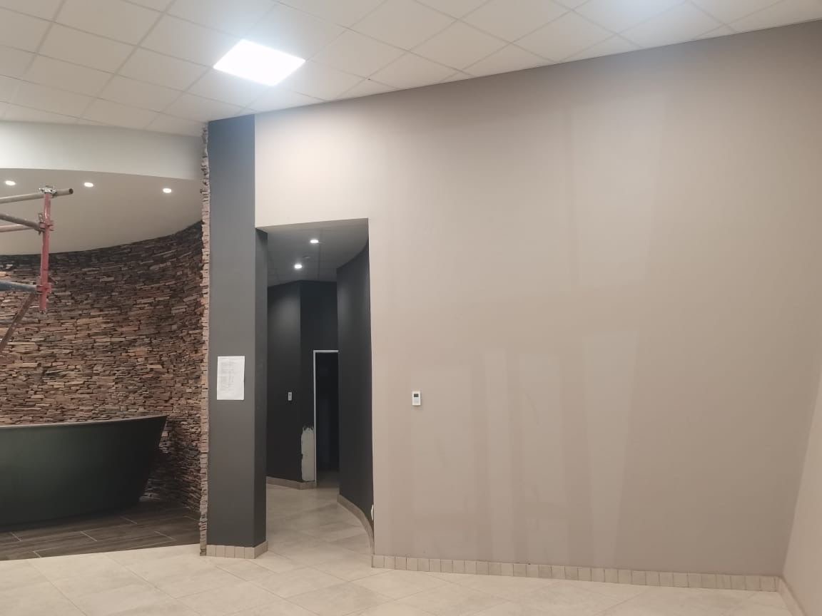 Interior fitout with stone wall and ceiling tiles