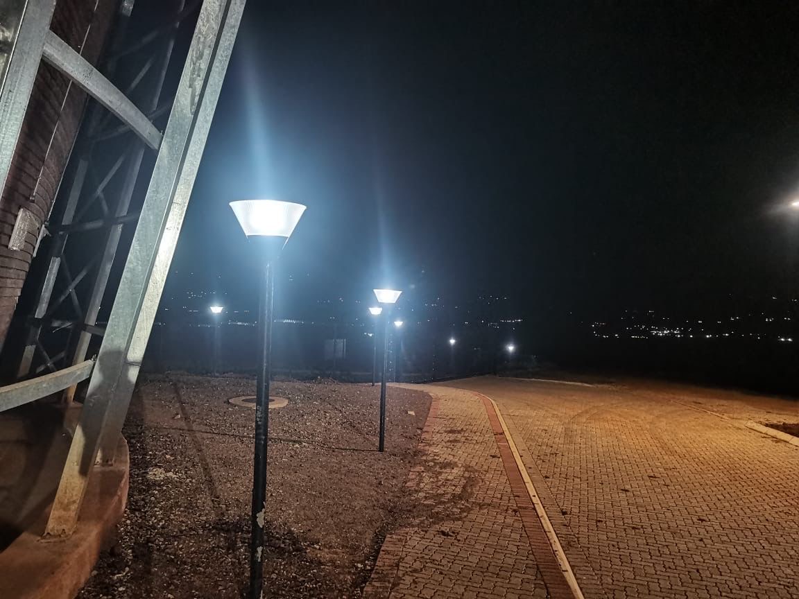 Night view of walkway with installed lights