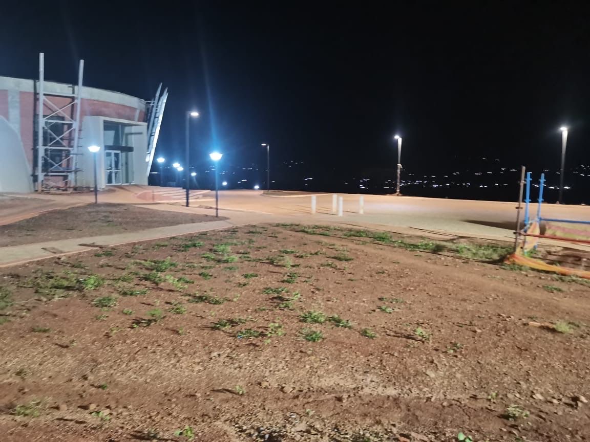Night view of facility with multiple street lights