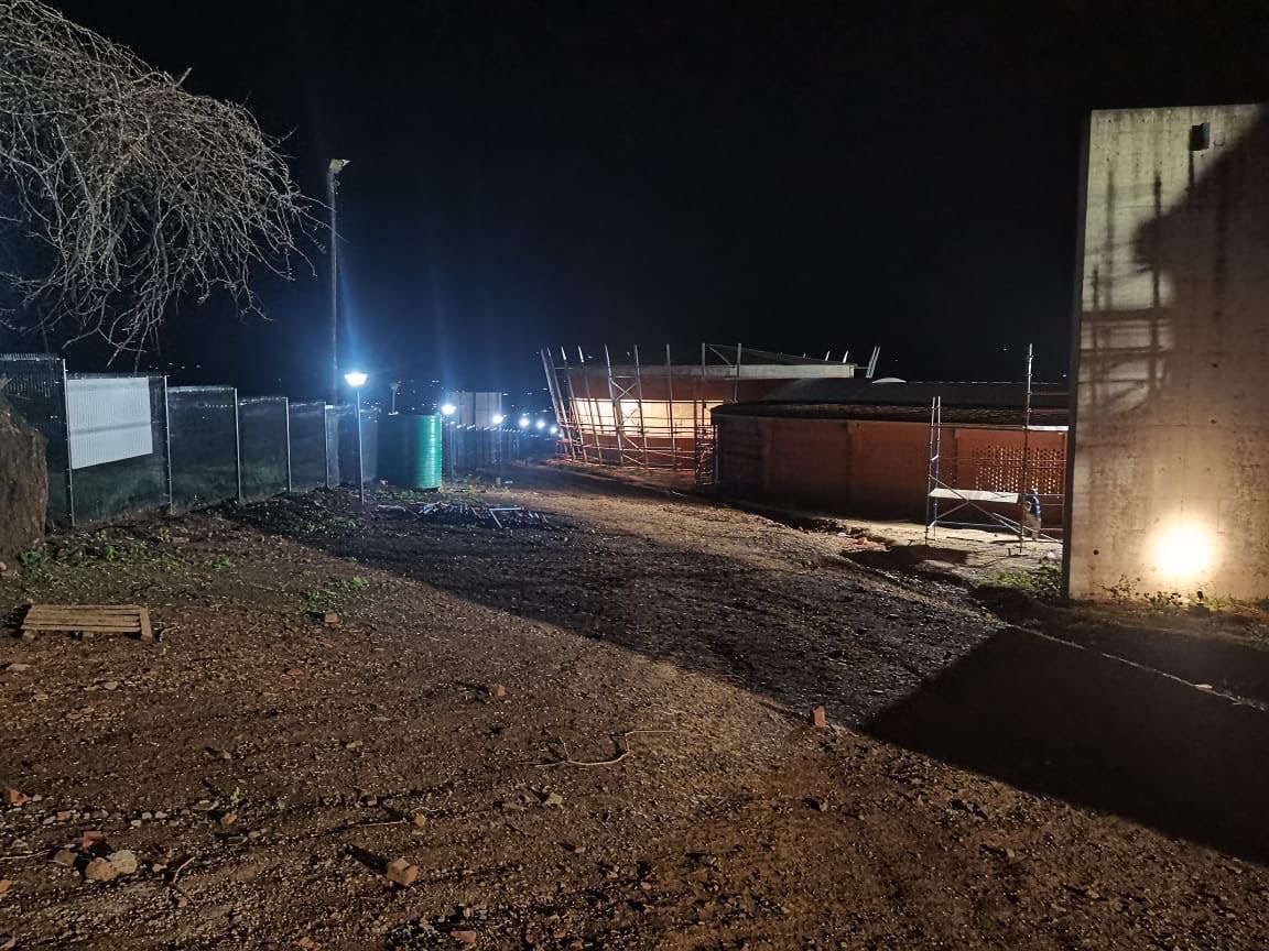 Night view of construction site with security lighting